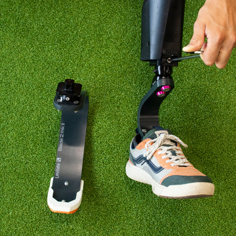 Levitate Blade 2 Mk II prosthetic foot on turf — adjustable and field-ready